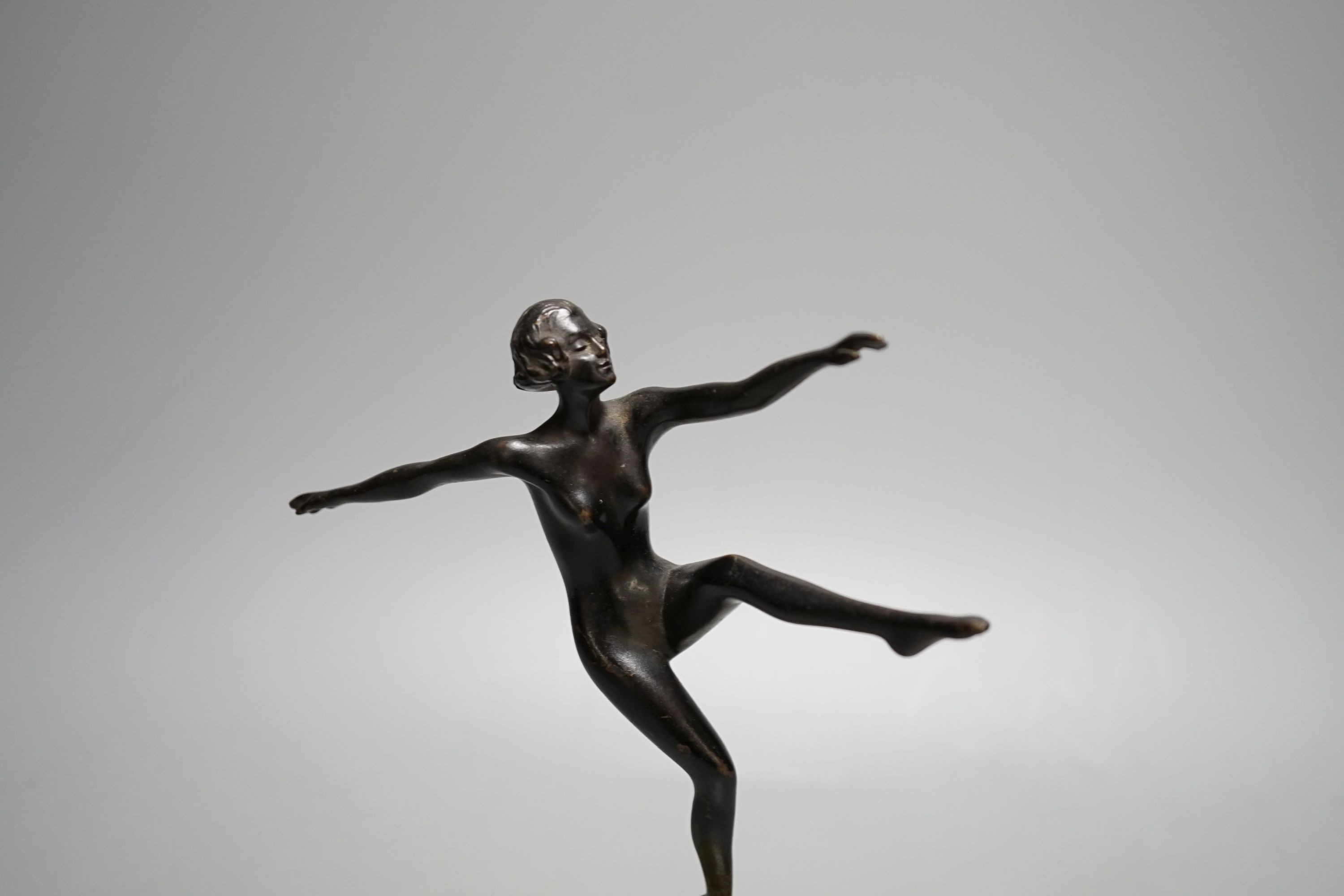 An Art Deco bronze figure of a nude dancer on onyx base - 22cm tall